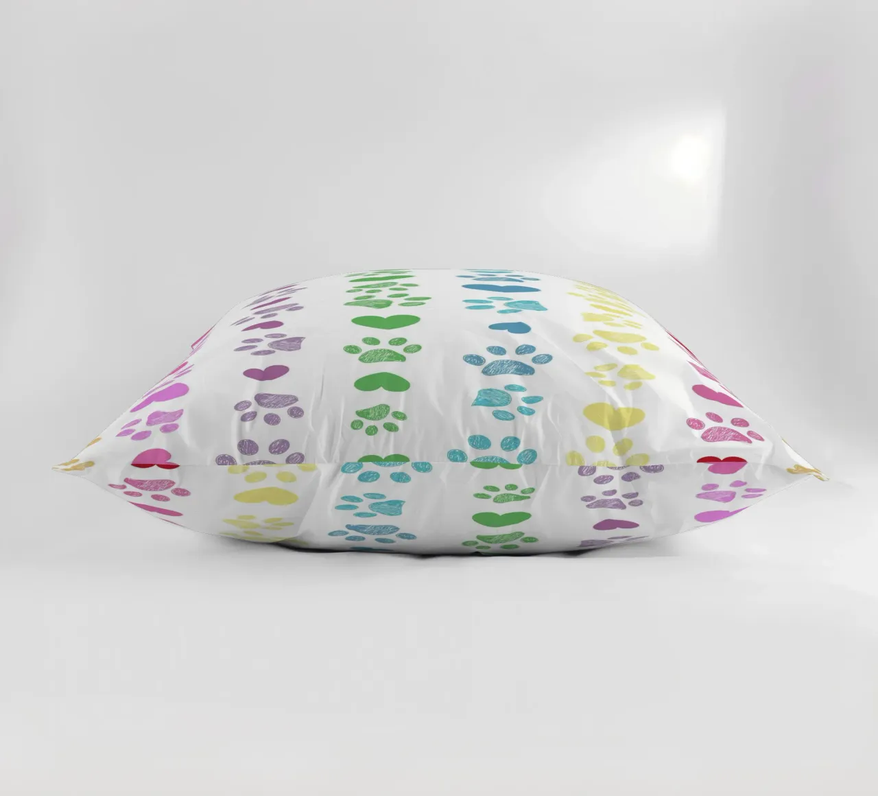 Soft rainbow seamless paw print pattern decorative cushion by gulsengunel