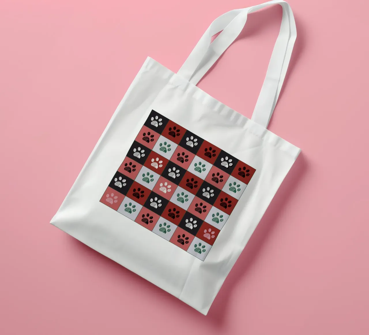 Plaid pattern Christmas design with paw prints tote bag by gulsengunel