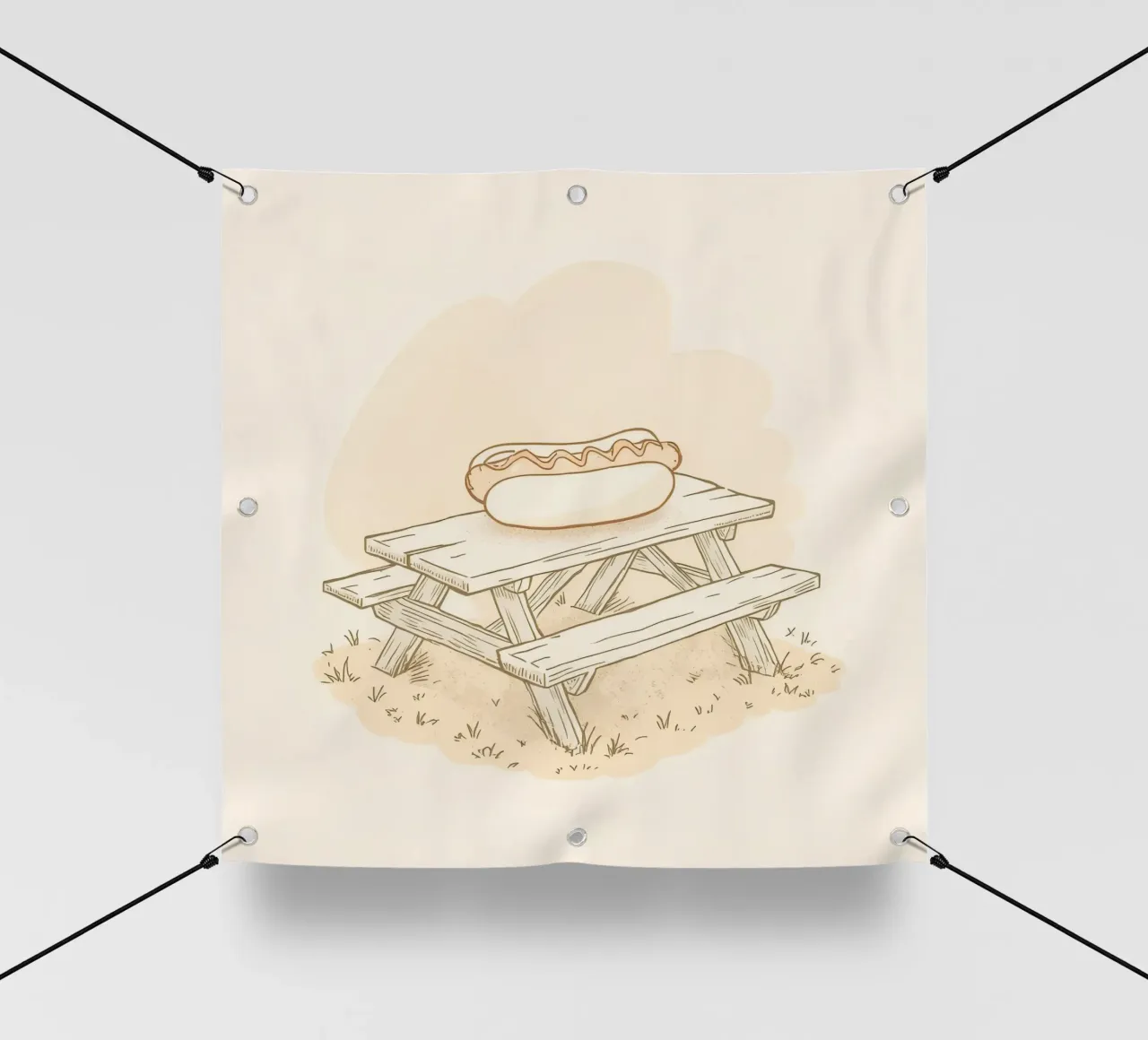 Perrito caliente descansando sobre una mesa de picnic de madera en un campo cubierto de hierba lonas publicitarias de DesignDoodle