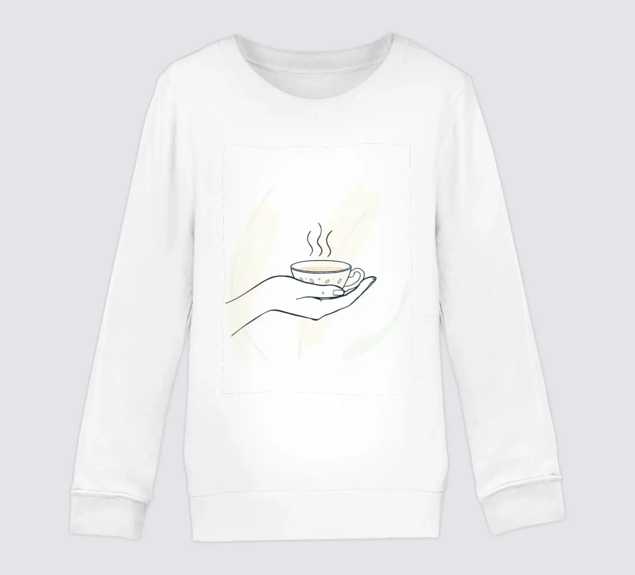 Mano sosteniendo una taza de té humeante sobre un fondo suave sudadera para niño de DesignDoodle