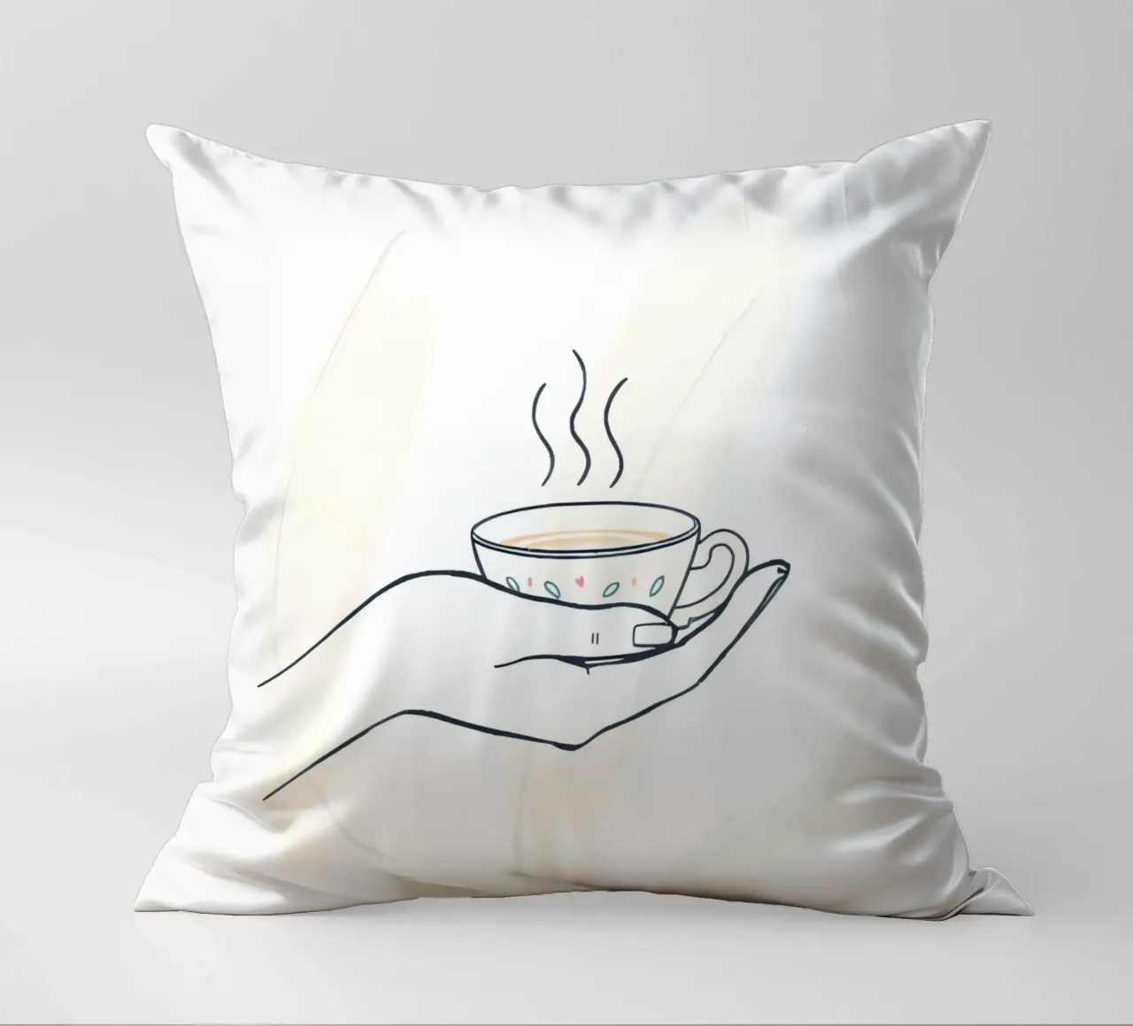 Mano che tiene una tazza di tè fumante su uno sfondo morbido cuscino da DesignDoodle