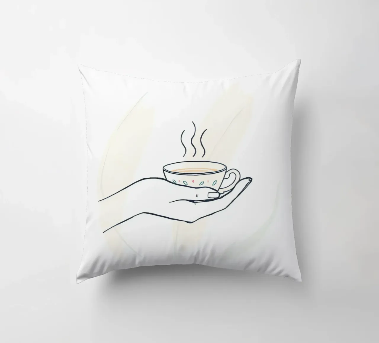 Mano che tiene una tazza di tè fumante su uno sfondo morbido cuscino da DesignDoodle