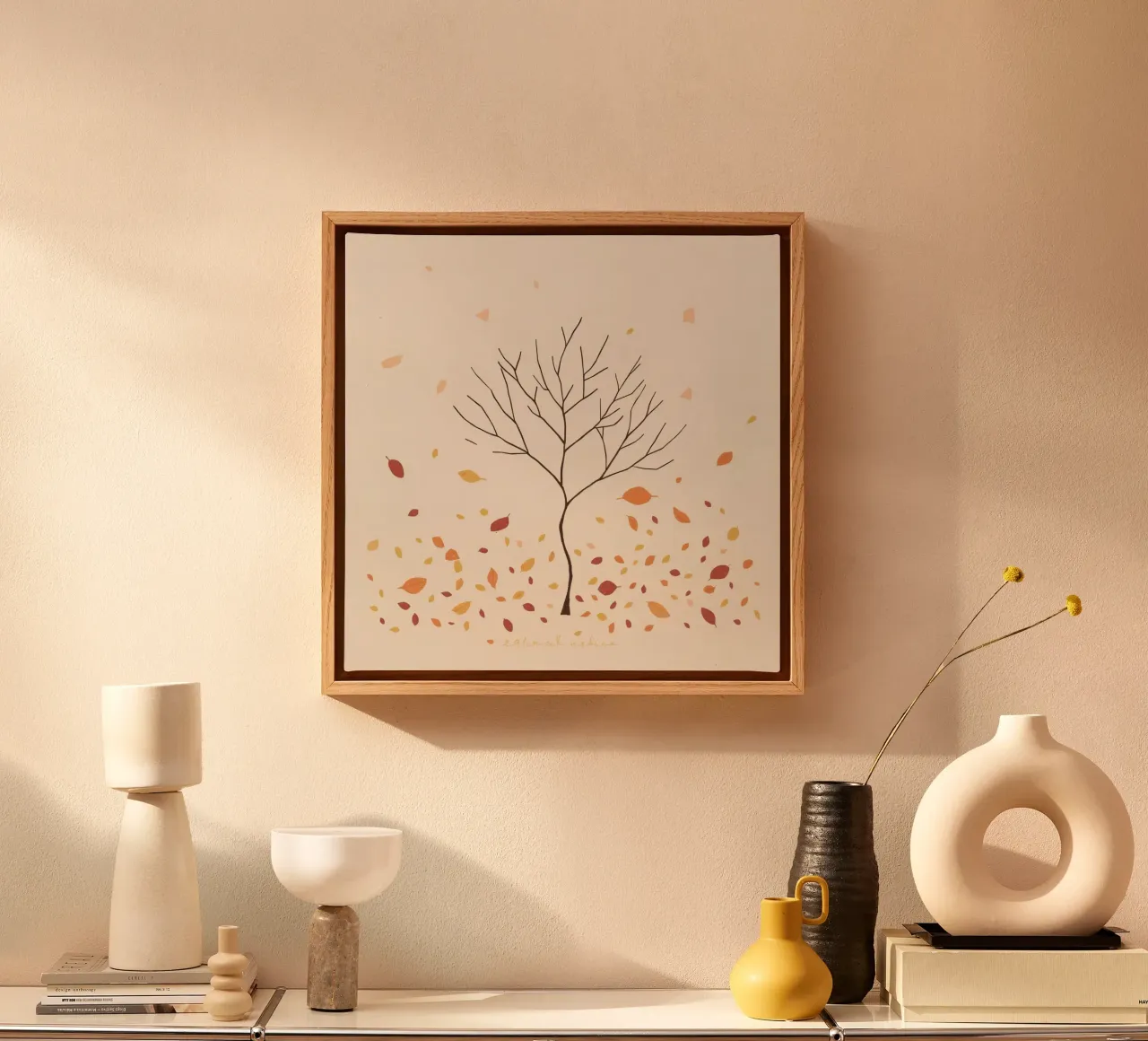 Bare tree surrounded by falling leaves in autumn season canvas with Floater frame by DesignDoodle