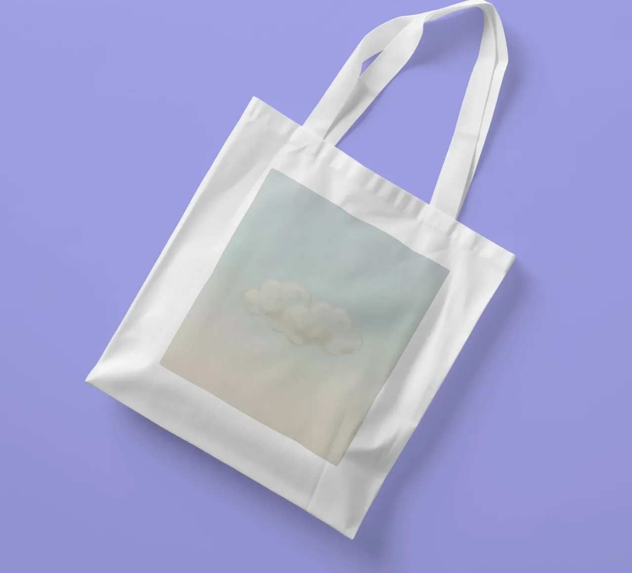 Una soffice nuvola bianca alla deriva in un cielo limpido sopra una terra serena borsa in juta da DesignDoodle