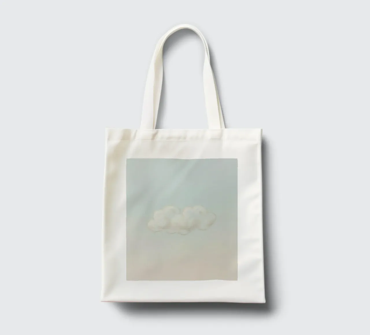 Una soffice nuvola bianca alla deriva in un cielo limpido sopra una terra serena borsa in juta da DesignDoodle