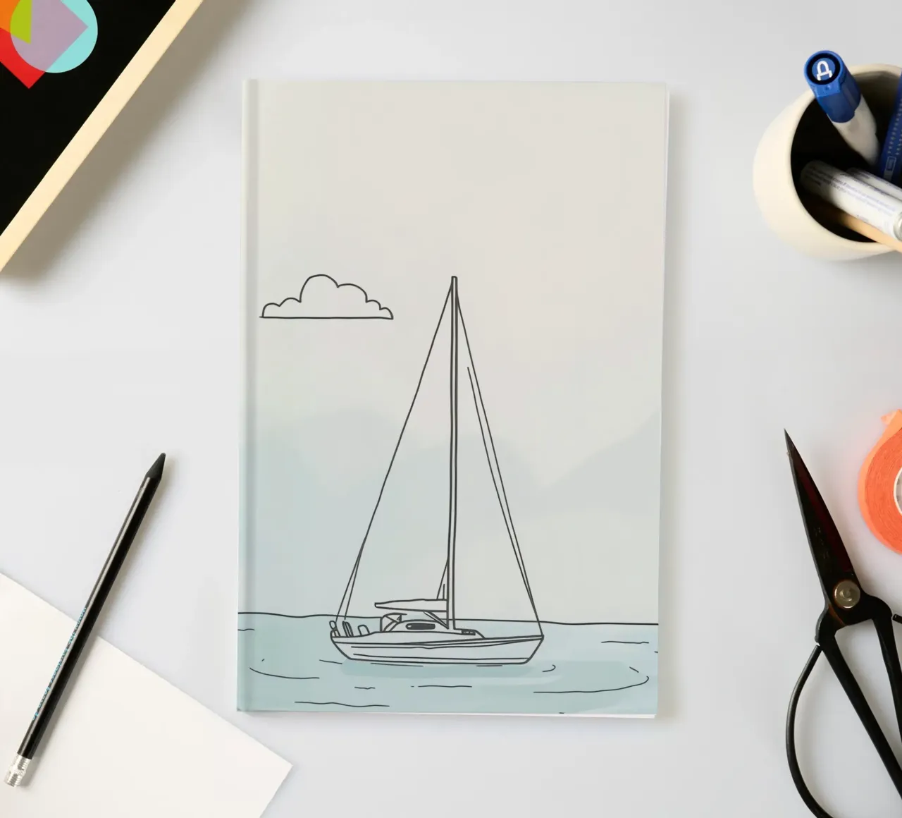 Sailboat drifting on calm waters under a light cloud in notebook by DesignDoodle