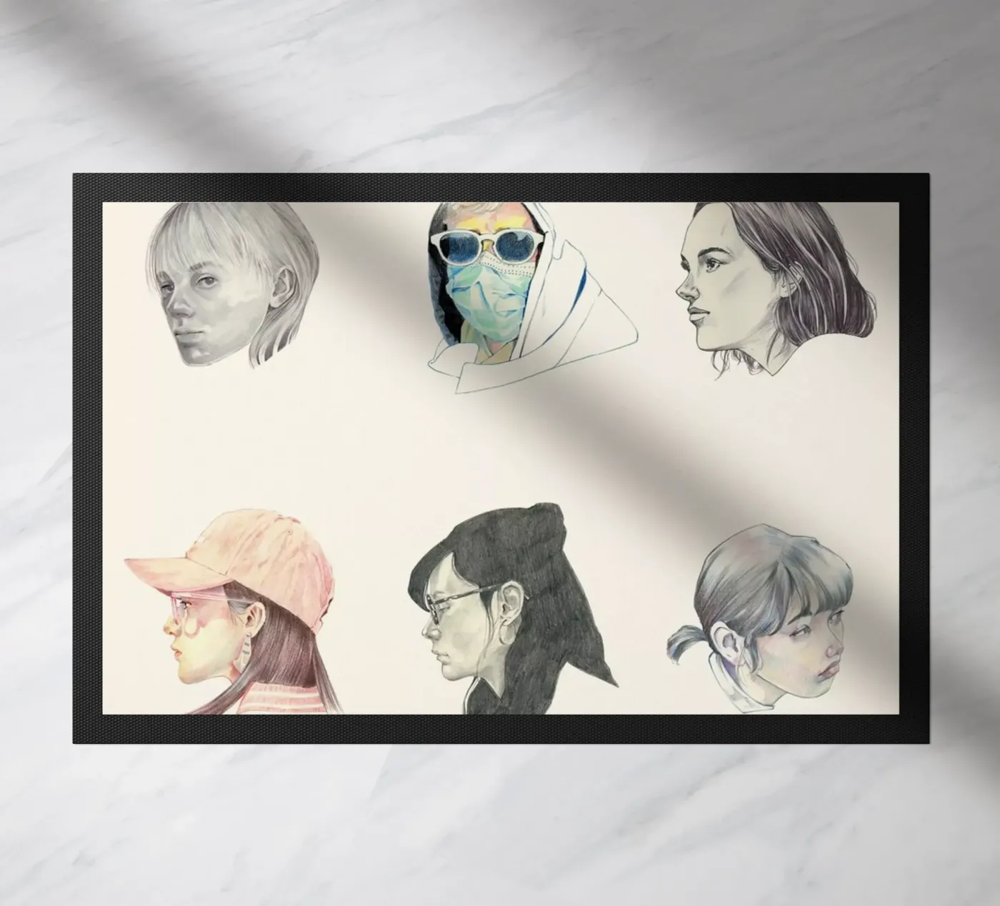 Faces doormat by Faunesque