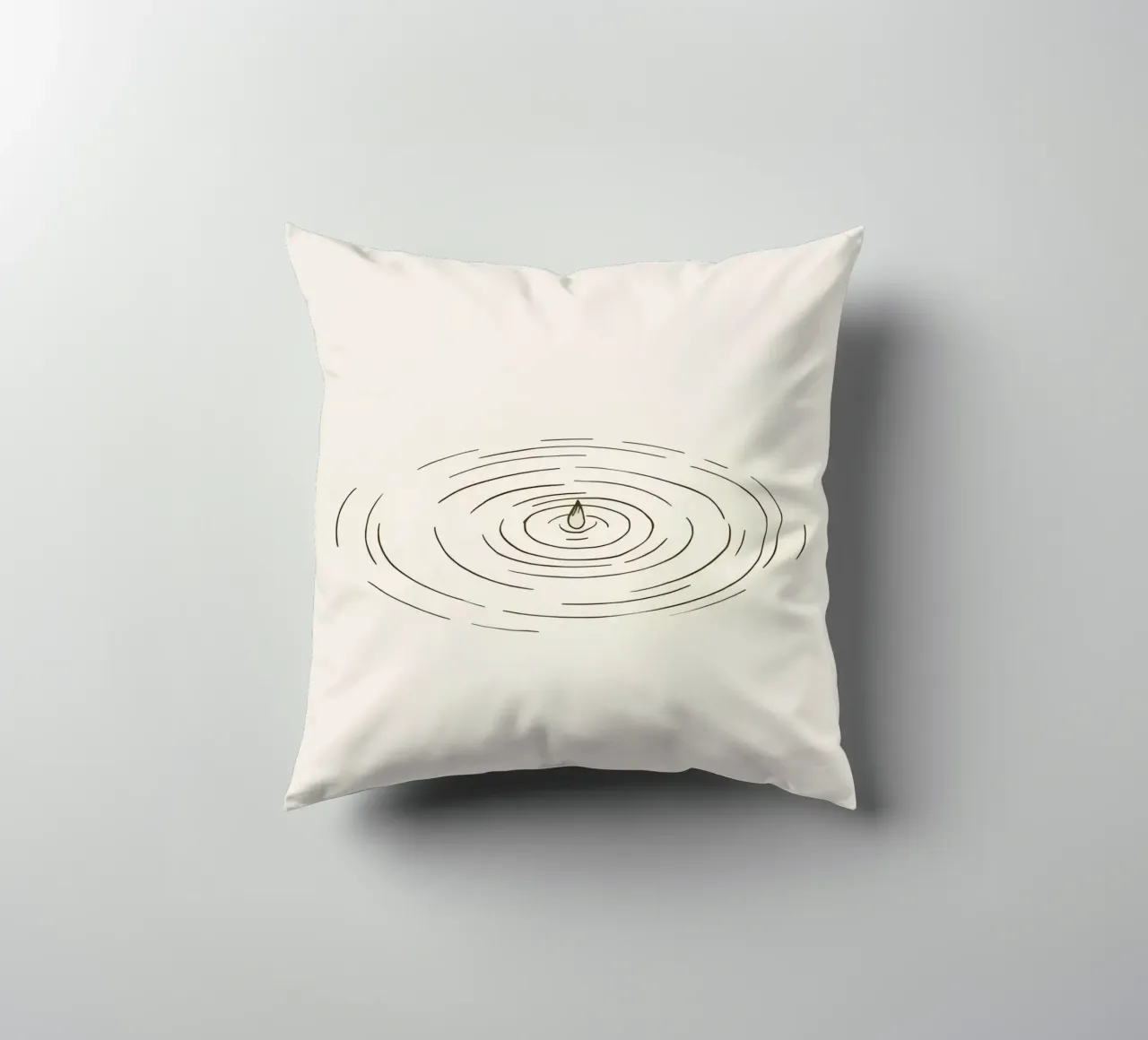 Ripples expanding in calm water created by a single drop decorative cushion by DesignDoodle