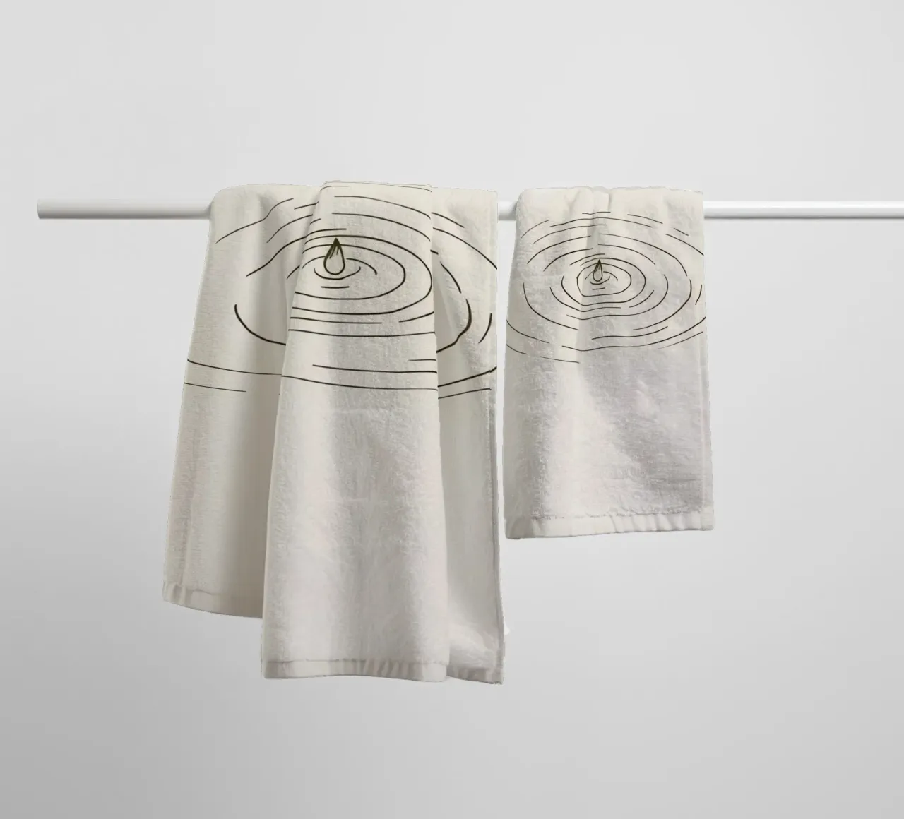 Ripples expanding in calm water created by a single drop towel by DesignDoodle