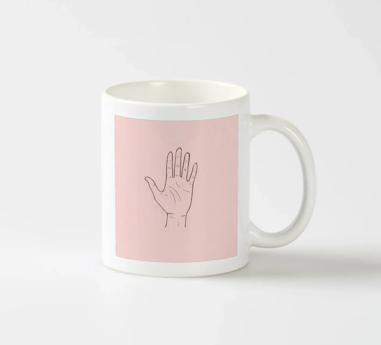 Illustrazione di un gesto della mano su uno sfondo rosa tenue tazza in ceramica da DesignDoodle