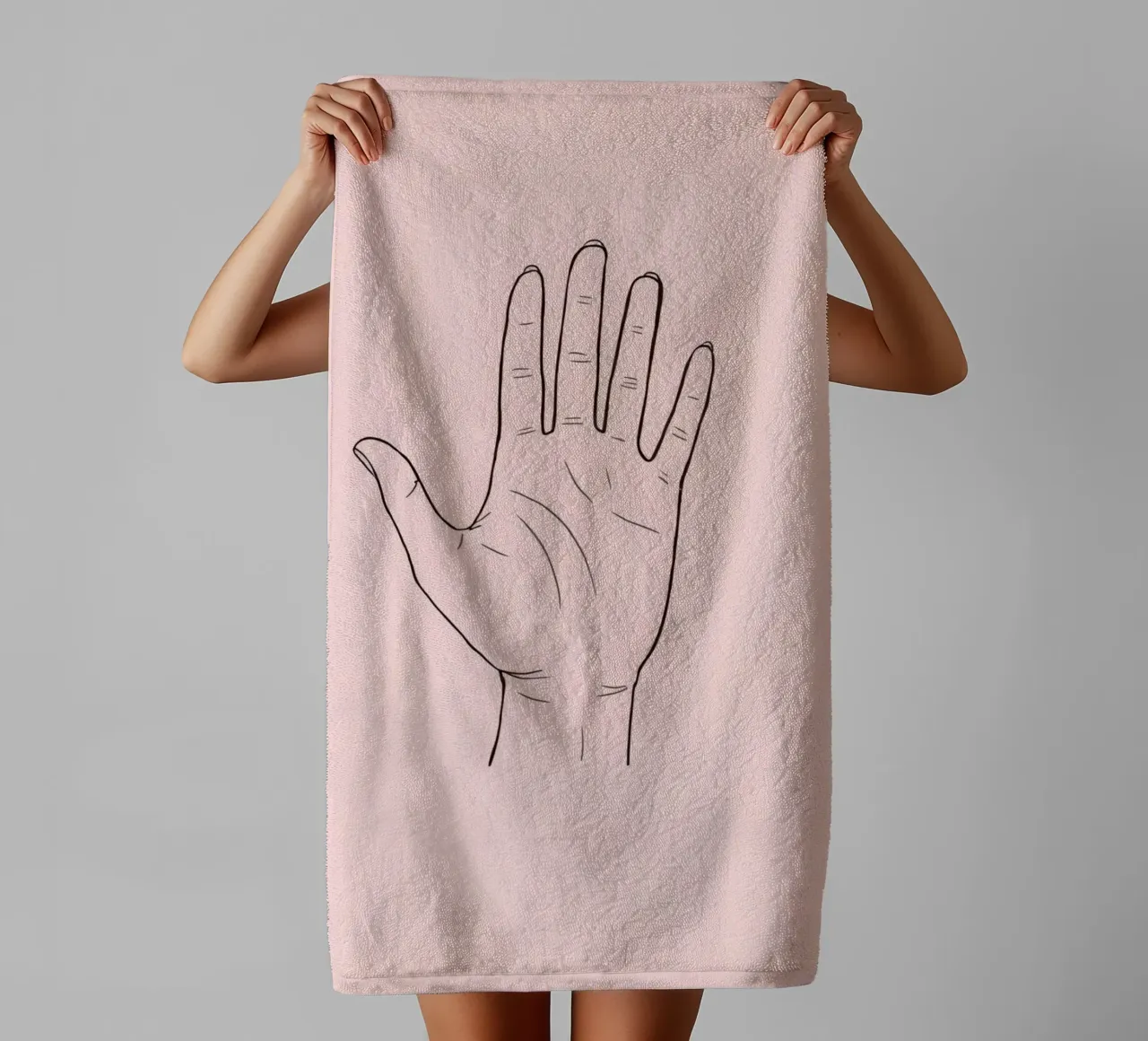 Illustration d'un geste de la main sur un fond rose doux serviette de bain de DesignDoodle