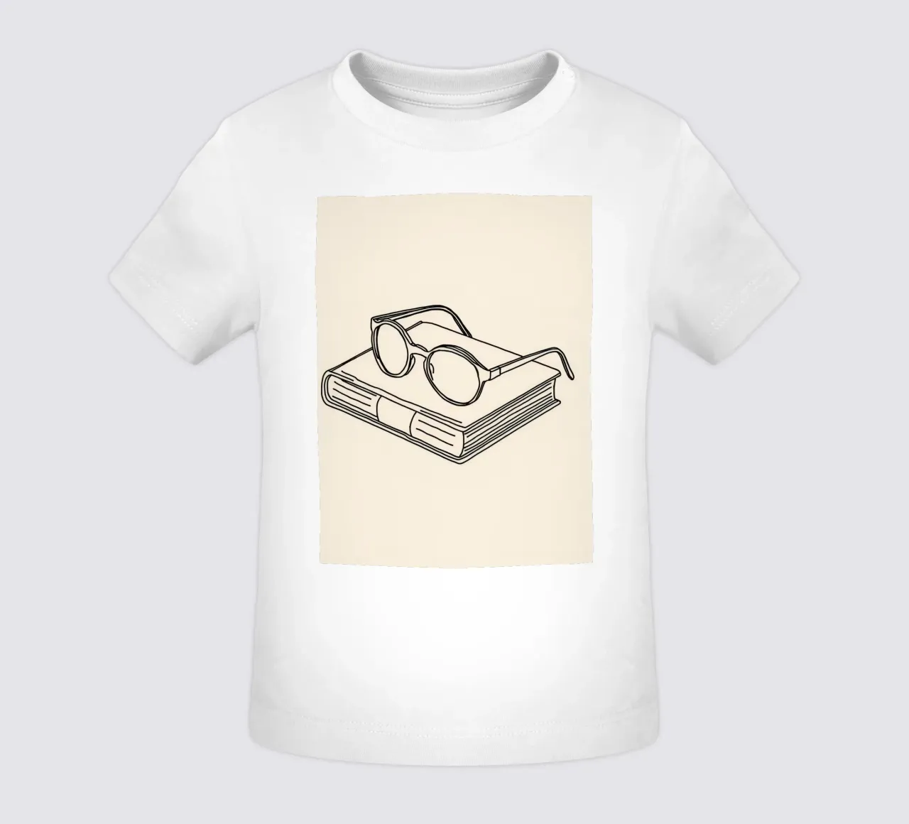 Occhiali su un libro chiuso che simboleggia la conoscenza e la lettura maglietta neonato da DesignDoodle