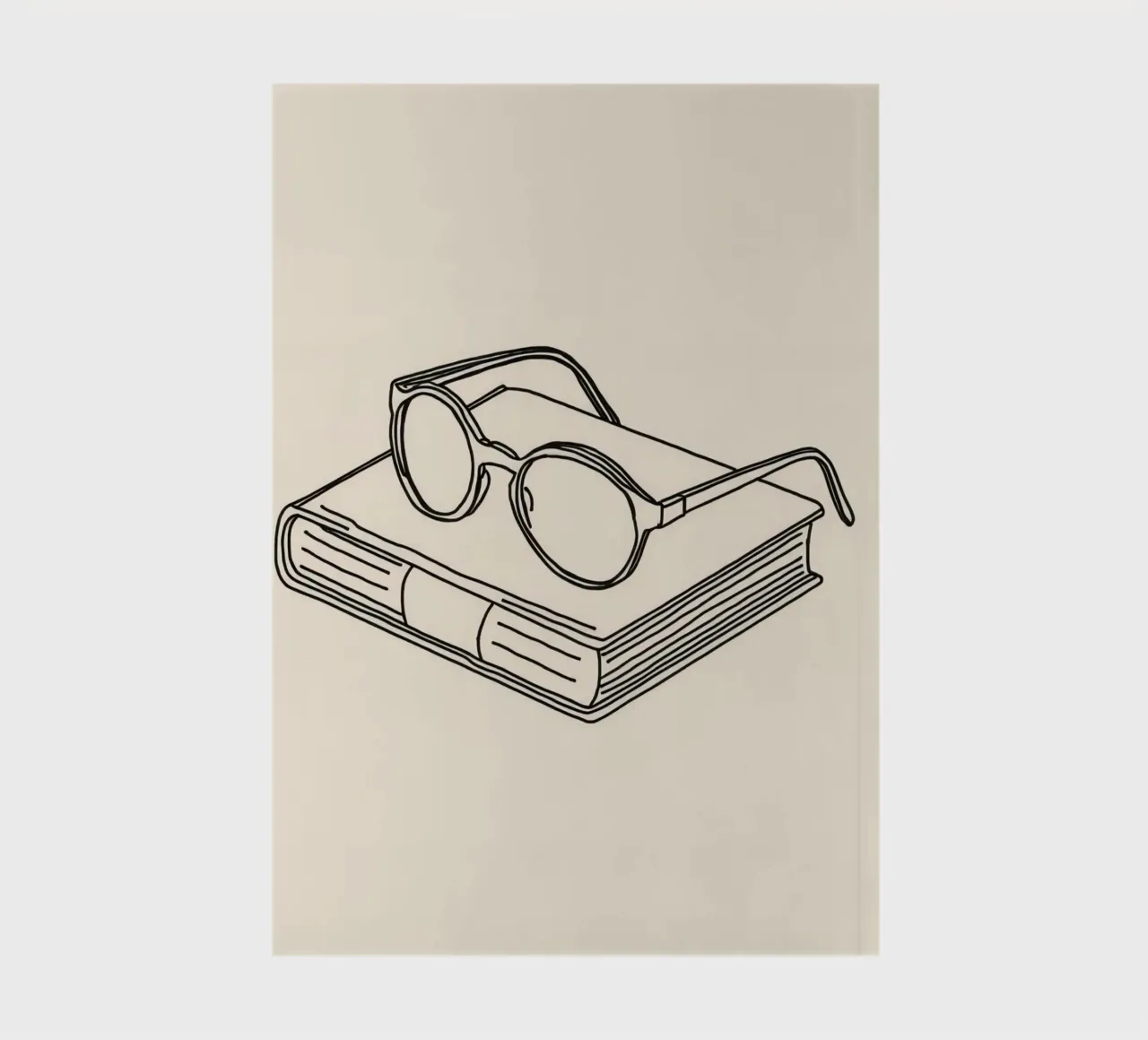 Glasses on a closed book symbolizing knowledge and reading notebook by DesignDoodle