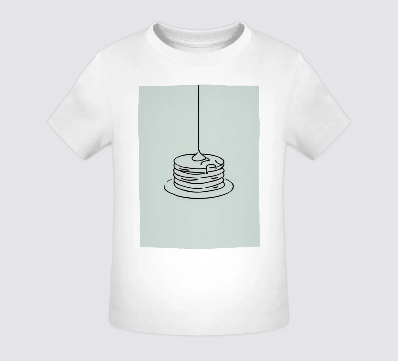Pancake impilati con sciroppo che cola su uno sfondo verde maglietta neonato da DesignDoodle