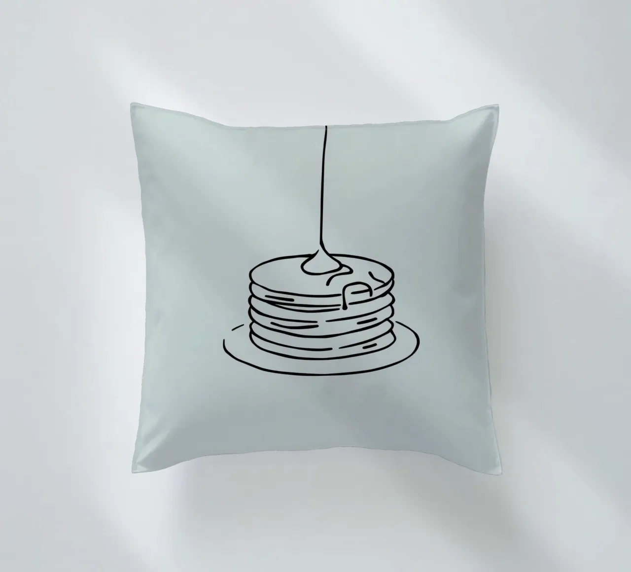 Stacked pancakes with syrup dripping on a green background decorative cushion by DesignDoodle