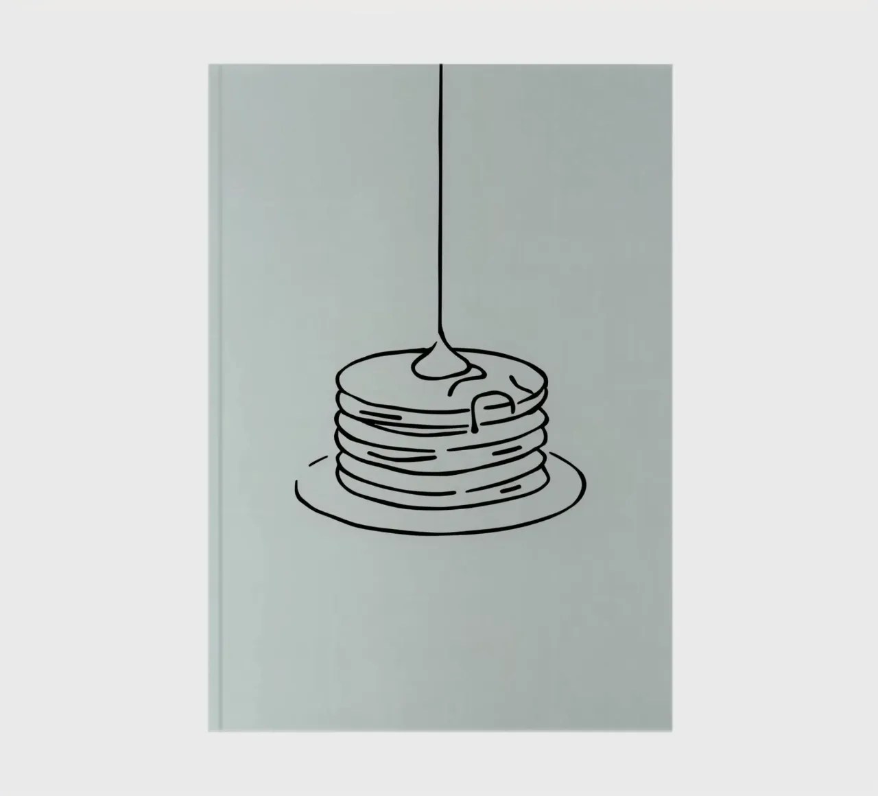 Stacked pancakes with syrup dripping on a green background notebook by DesignDoodle