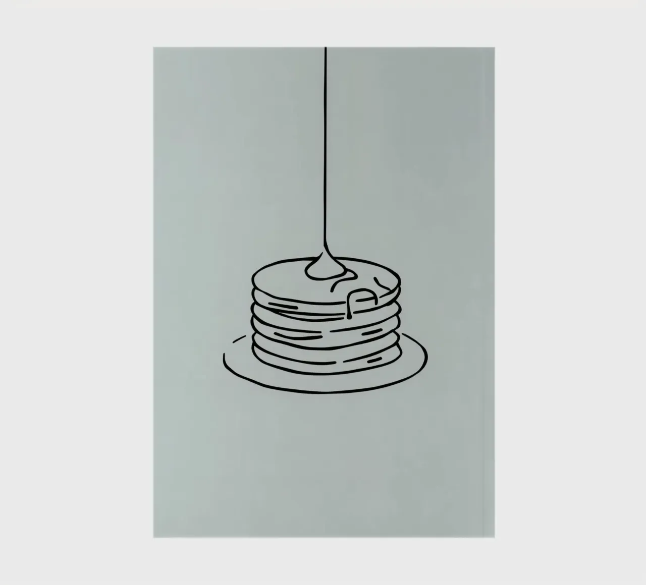 Stacked pancakes with syrup dripping on a green background notebook by DesignDoodle