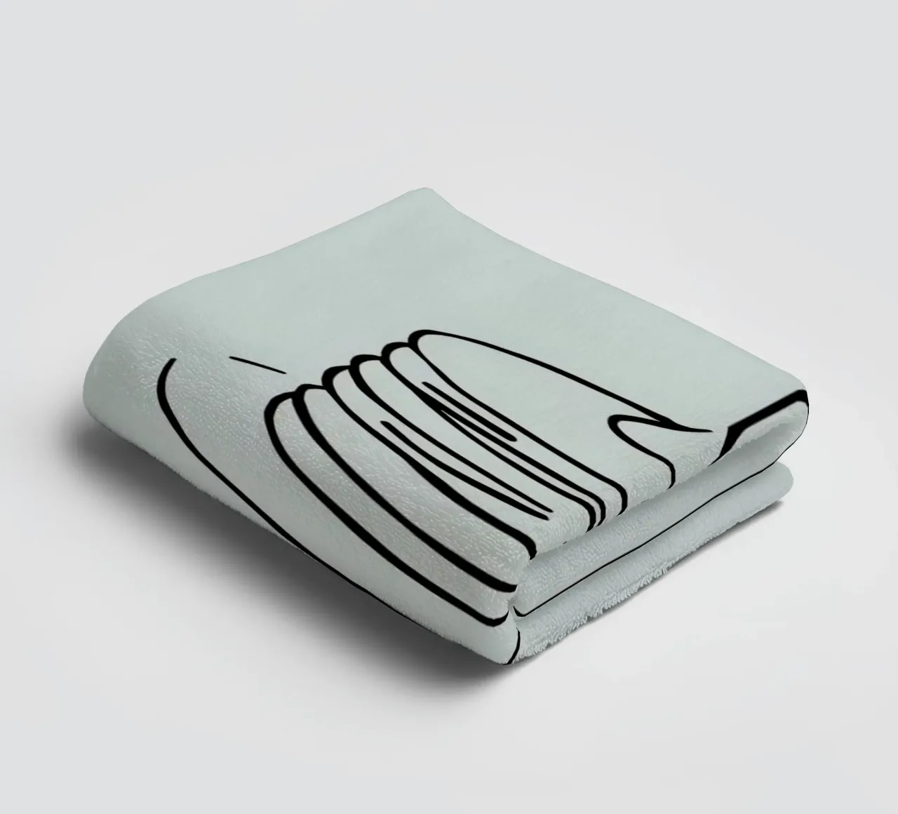 Stacked pancakes with syrup dripping on a green background towel by DesignDoodle