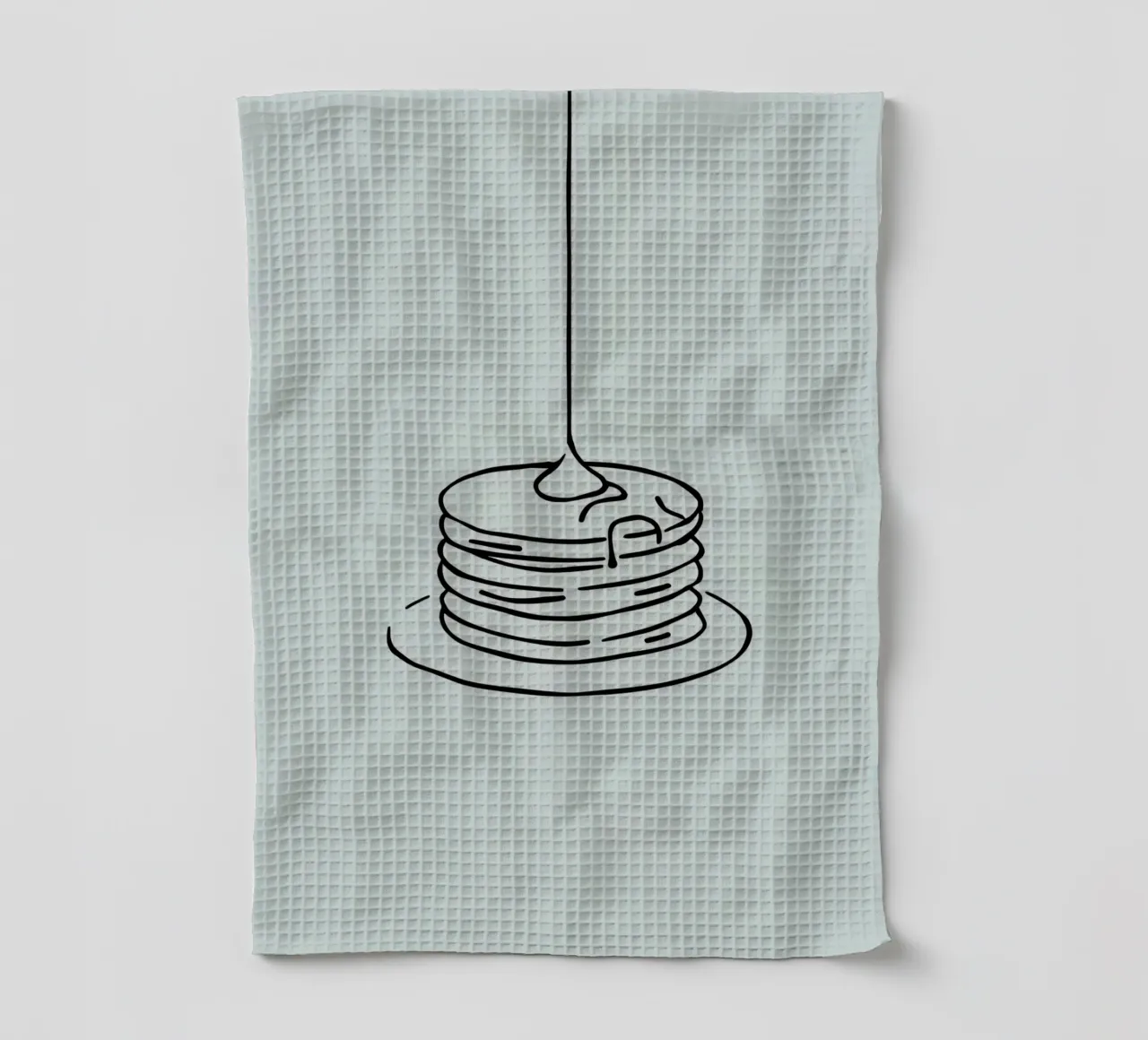 Stacked pancakes with syrup dripping on a green background tea towel by DesignDoodle