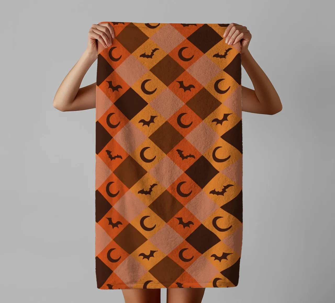 Pumpkin with plaid pattern bats and moon towel by gulsengunel