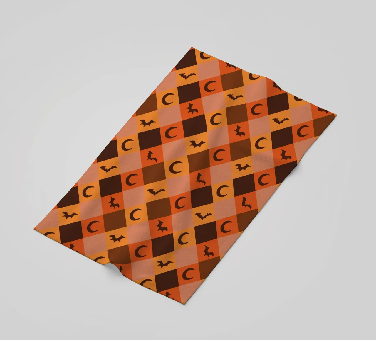 Pumpkin with plaid pattern bats and moon beach towel by gulsengunel