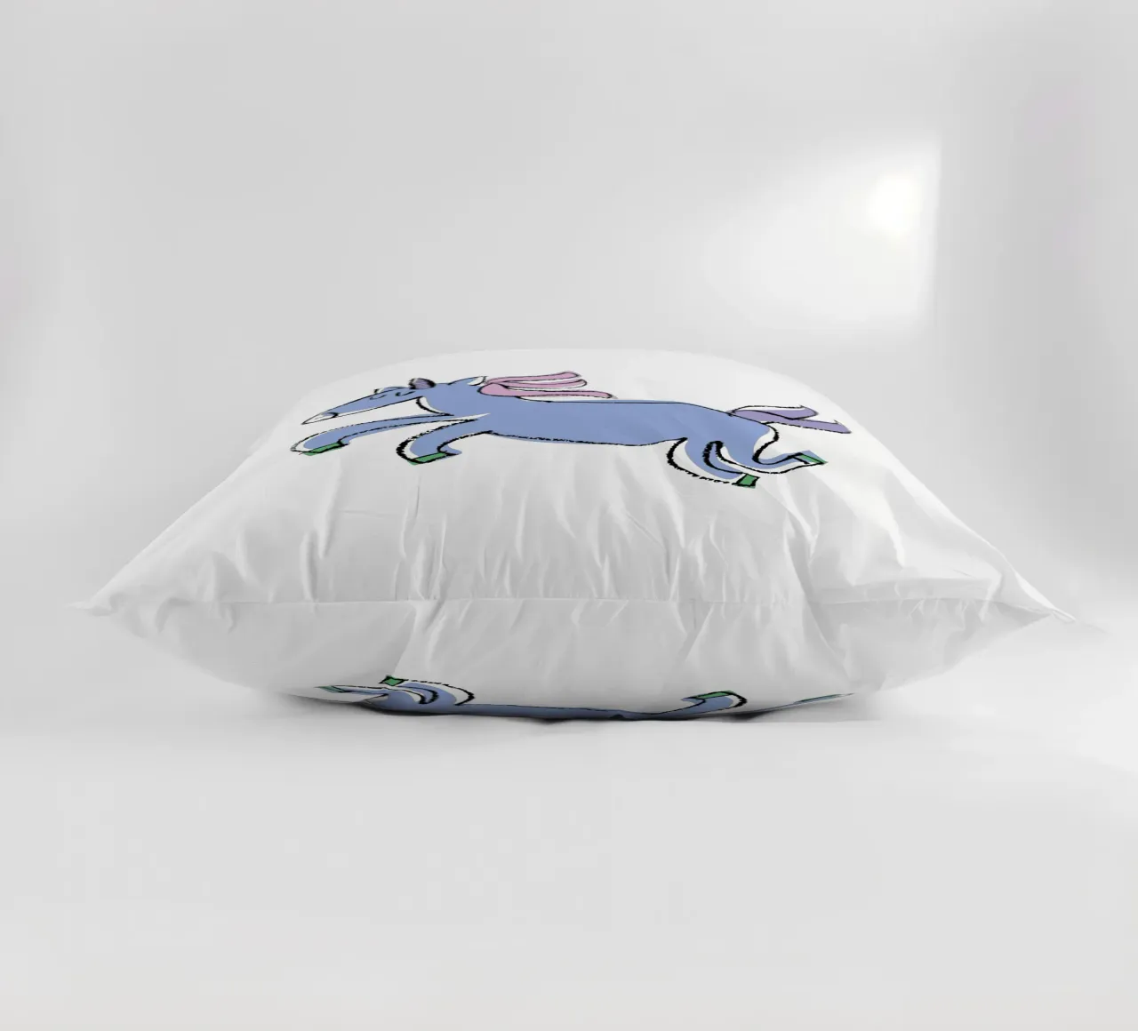 Himmelblaues gute Laune-Einhorn decorative cushion by Brushmeetspaper