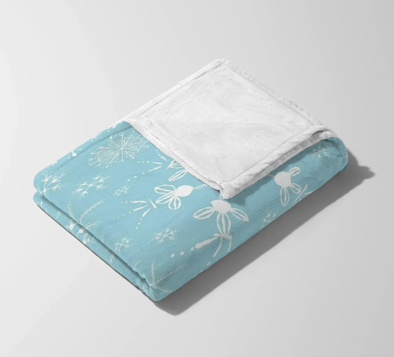 White snowflakes with blue background pattern fleece blanket by gulsengunel