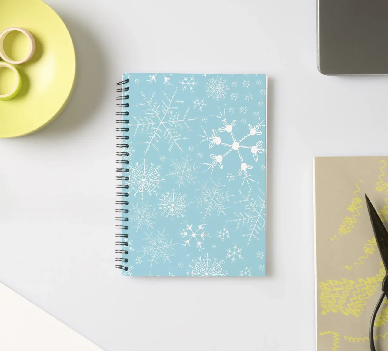 White snowflakes with blue background pattern spiral notebook by gulsengunel
