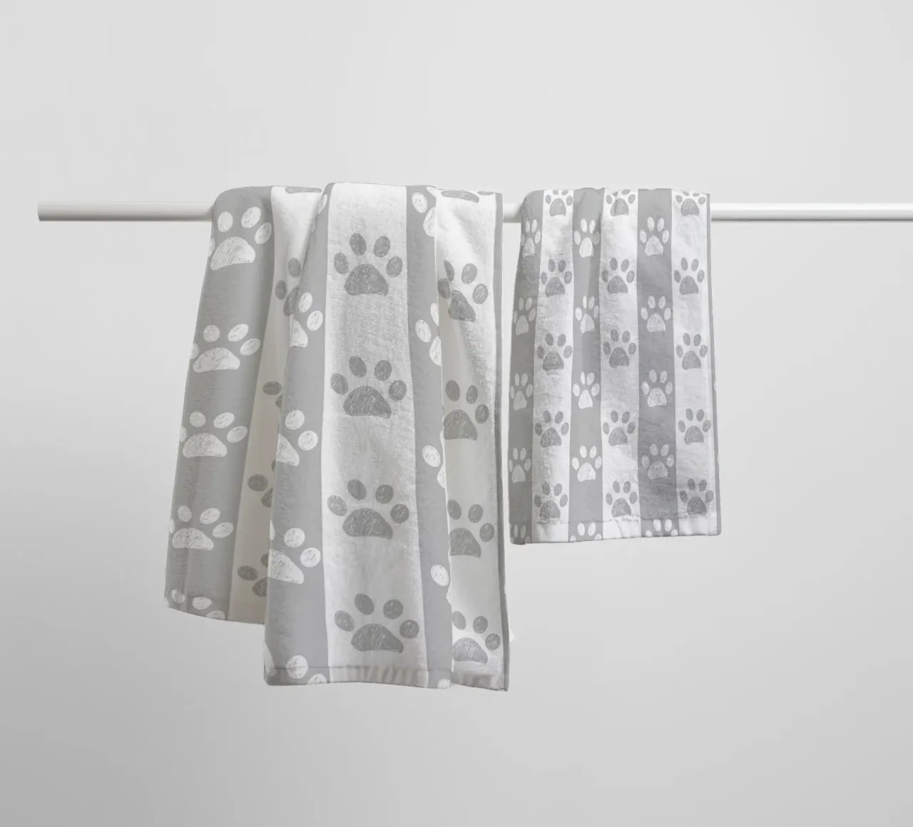 Grey and white stripe pattern with doodle paw print towel by gulsengunel
