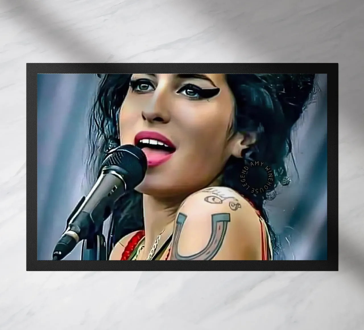 Amy Winehouse zerbino da Musadad Shop