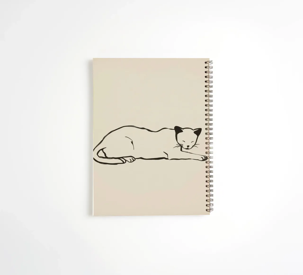 Relaxed cat resting comfortably with eyes closed spiral notebook by DesignDoodle