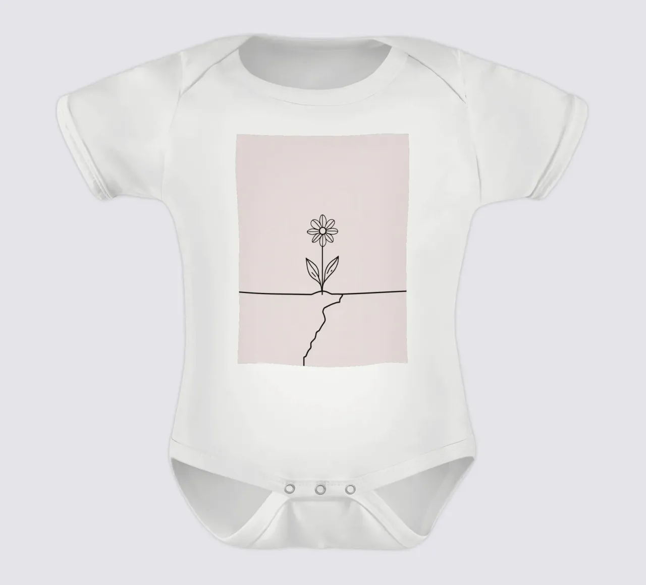 La fleur qui pousse à partir d'une fissure dans la surface symbolise la résilience body bébé de DesignDoodle