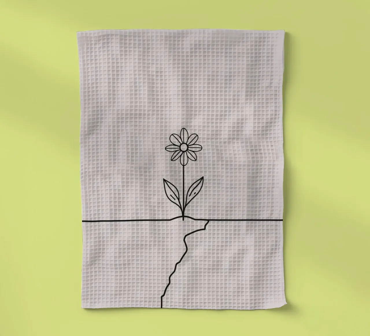 La fleur qui pousse à partir d'une fissure dans la surface symbolise la résilience torchon de DesignDoodle