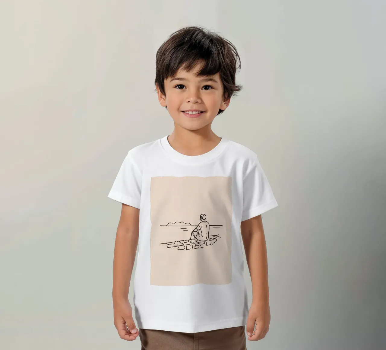 man reflects by the water while sitting on the shore kids t-shirt by DesignDoodle