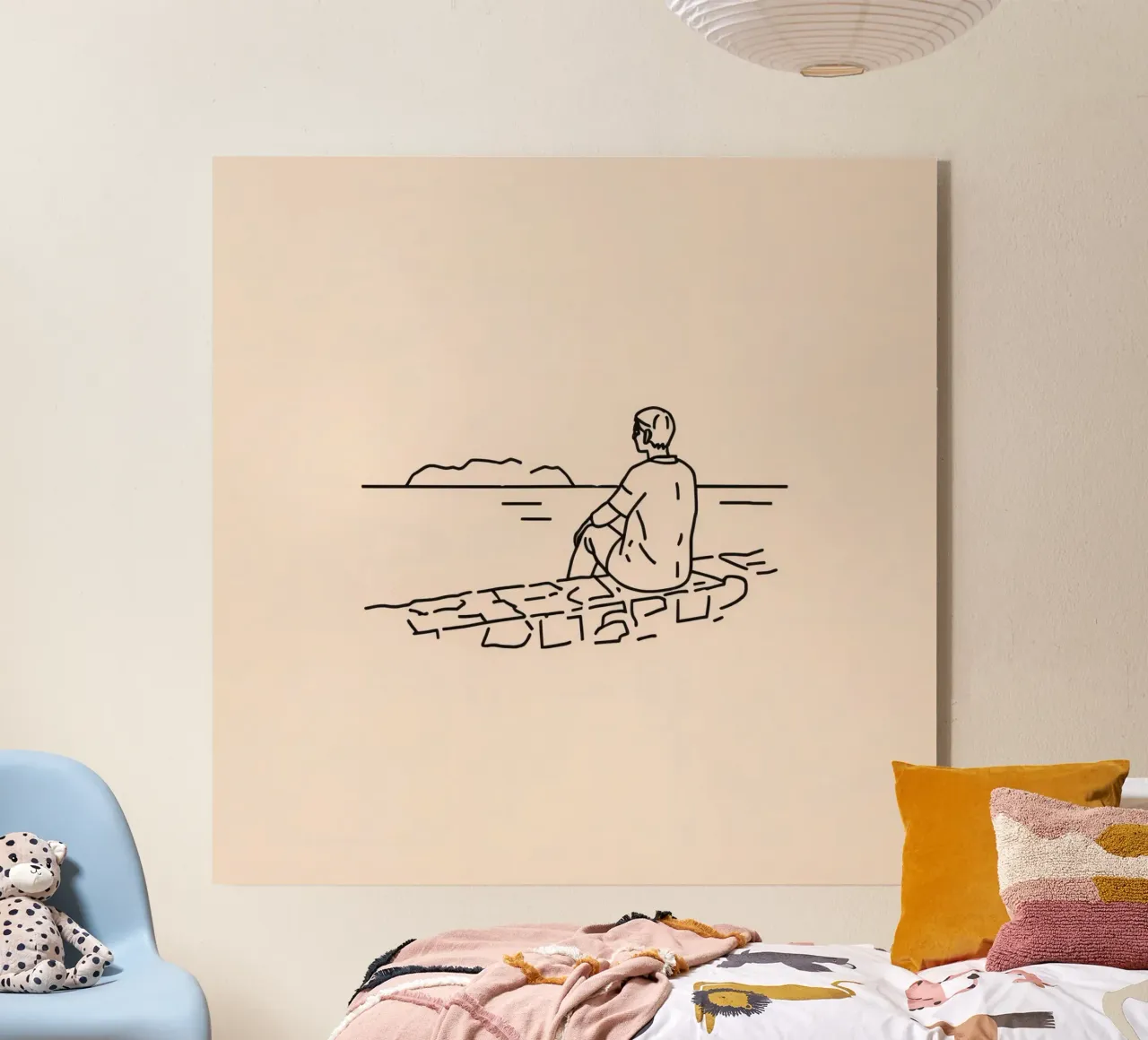 man reflects by the water while sitting on the shore acrylic glass by DesignDoodle