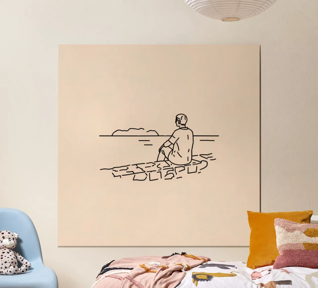 man reflects by the water while sitting on the shore hahnemühle by DesignDoodle