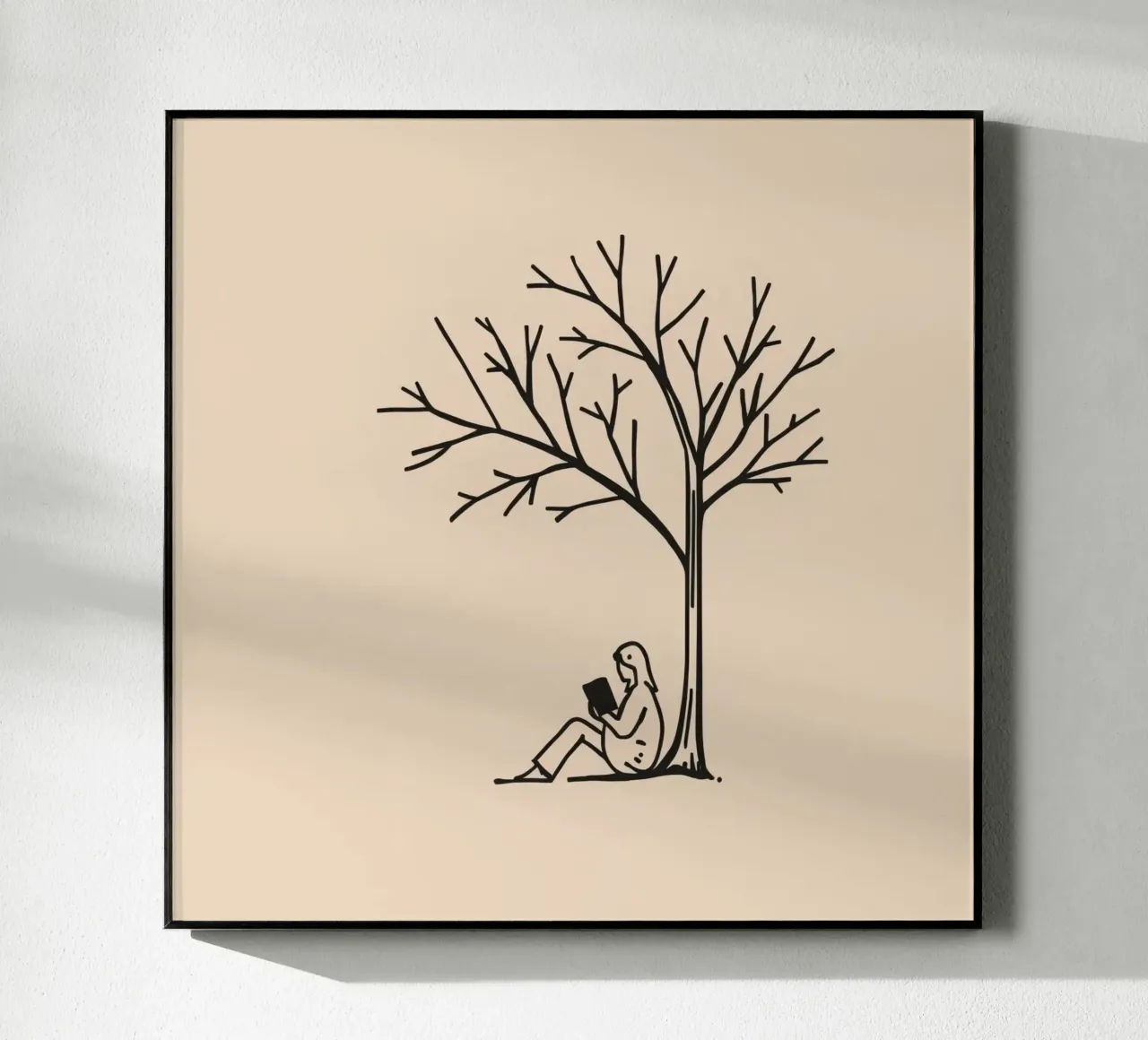 Persona leyendo un libro bajo un árbol desnudo en una tarde cálida metacrilato de DesignDoodle