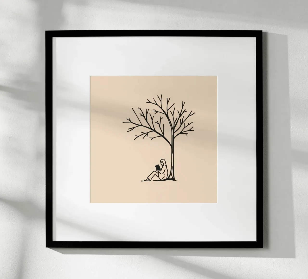 Person reading a book under a bare tree on a warm afternoon hahnemühle by DesignDoodle