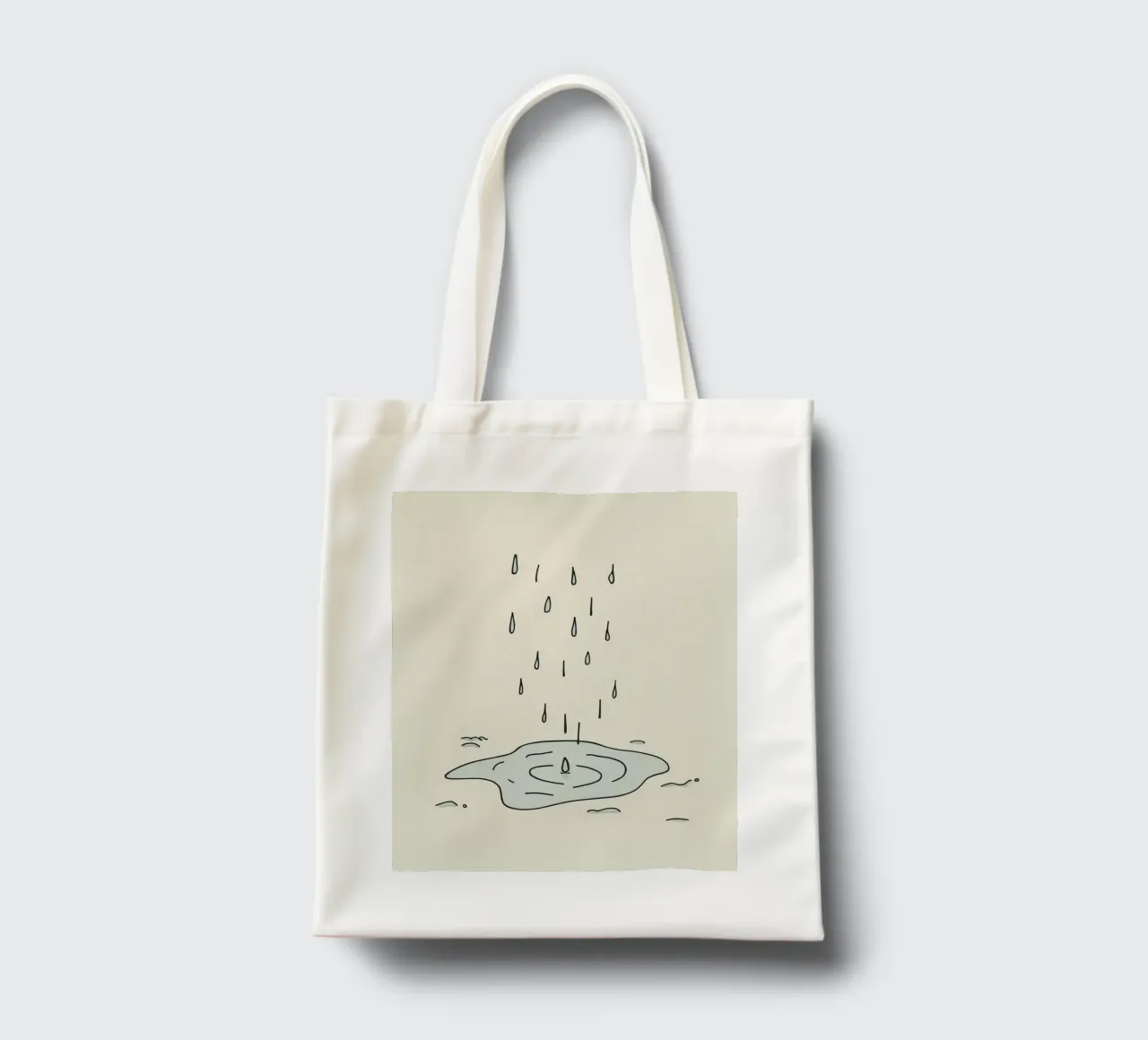 Gocce di acqua piovana che creano increspature in una piccola pozzanghera borsa in juta da DesignDoodle