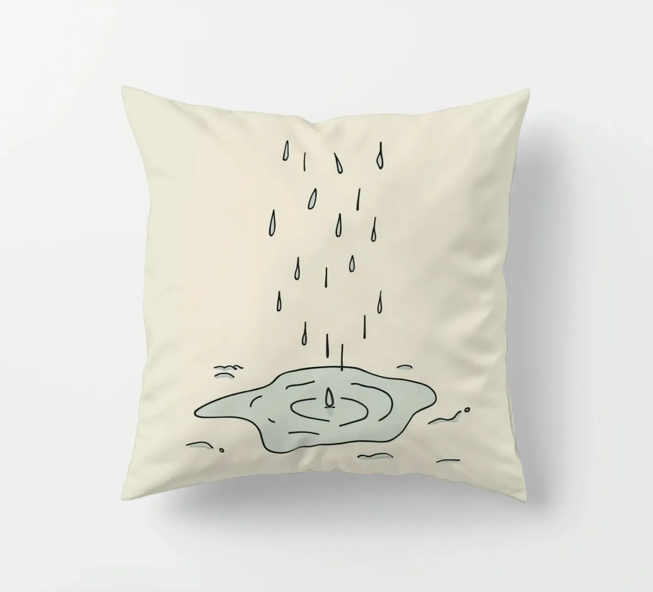 Gocce di acqua piovana che creano increspature in una piccola pozzanghera cuscino da DesignDoodle