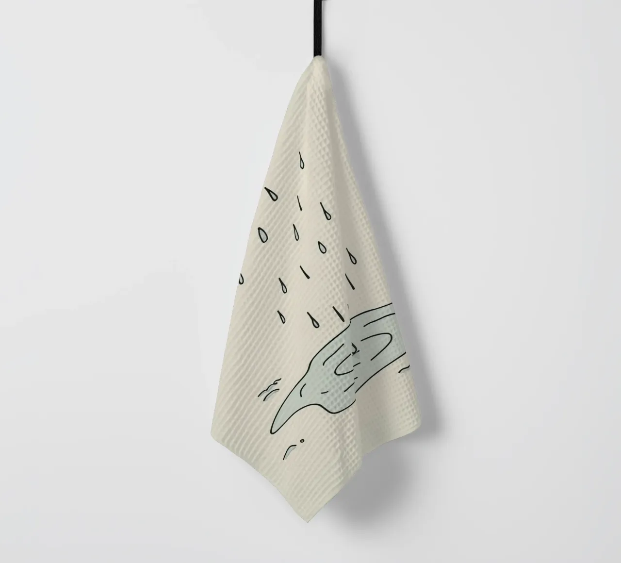 Gocce di acqua piovana che creano increspature in una piccola pozzanghera canovaccio da cucina da DesignDoodle