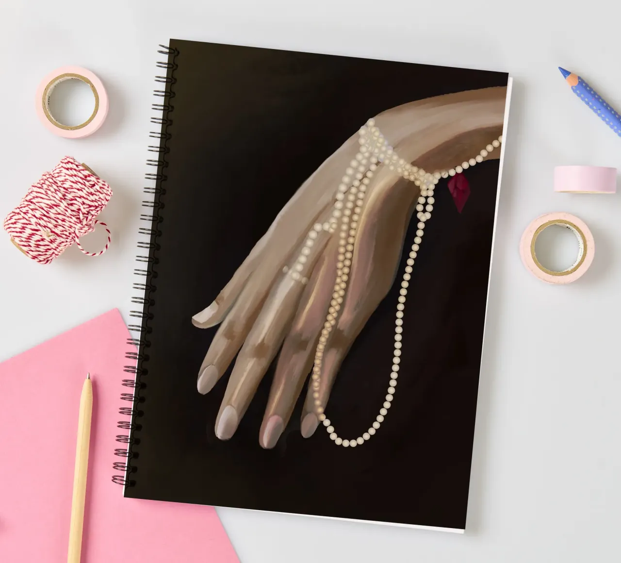 Feminine Hand Draped in Pearls with Soft Shadow Lighting diario ad anelli da mysteriouscoco