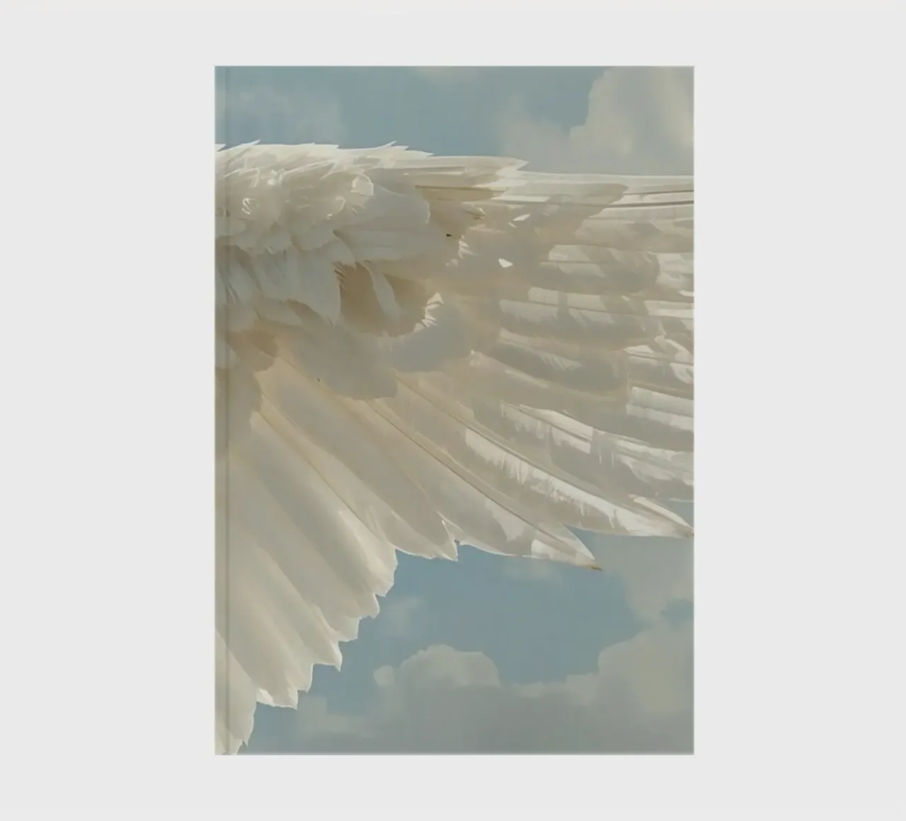 white bird wing against cloudy sky showing delicate feathers notebook by DesignDoodle