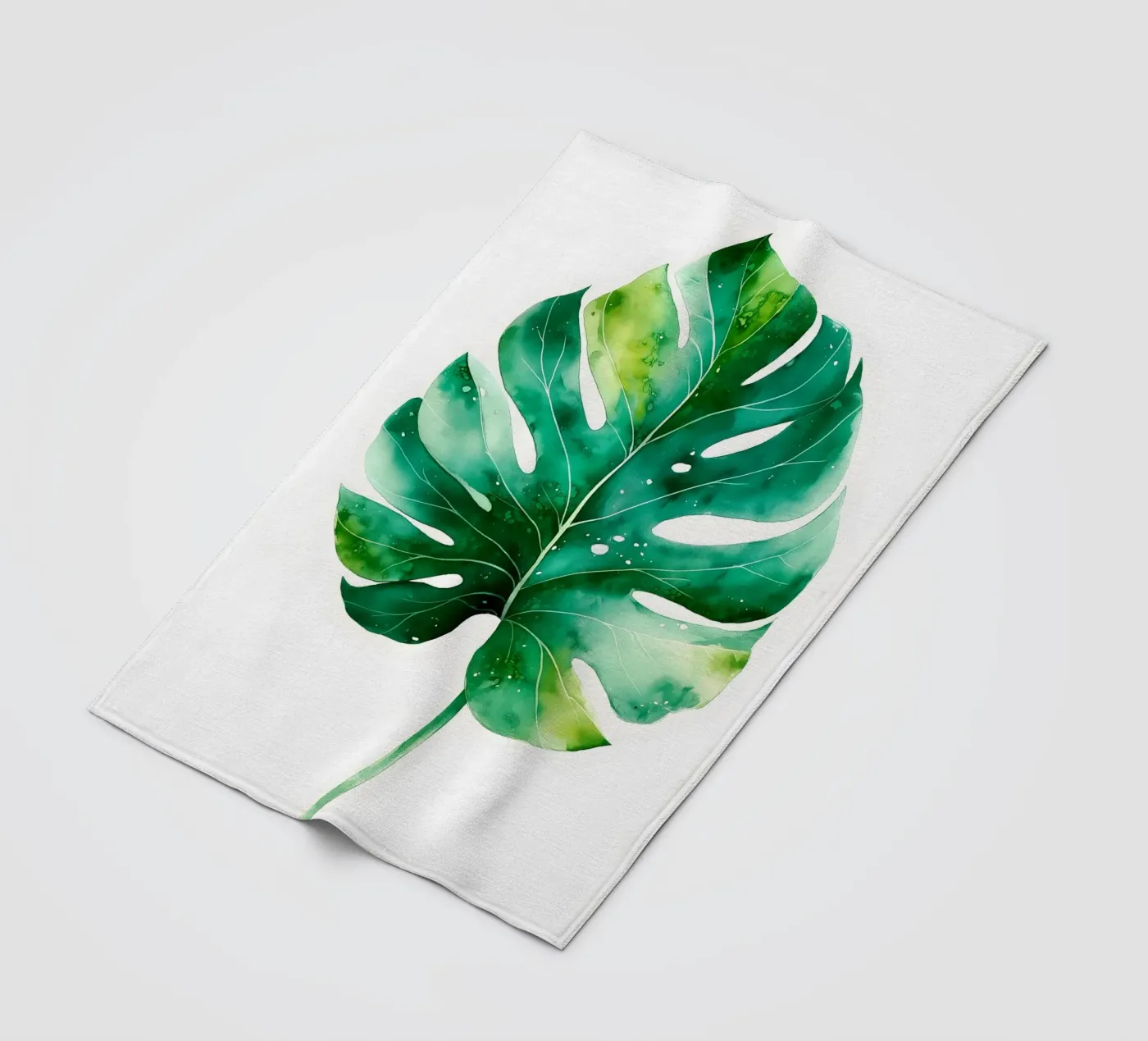 Monstera leaf fleece blanket by Studio Verde