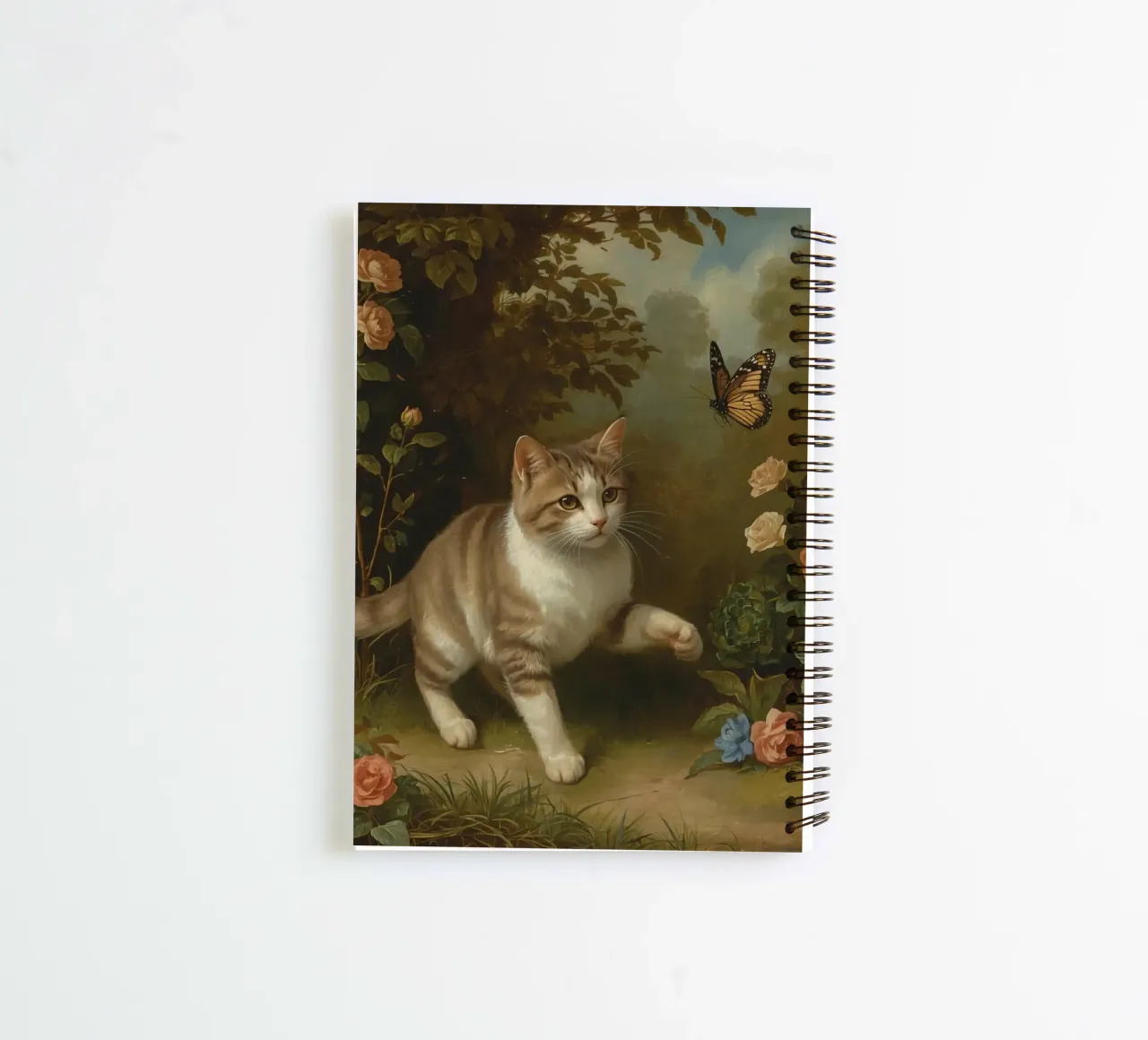 Cat strolling through garden while playing with a butterfly spiral notebook by DesignDoodle