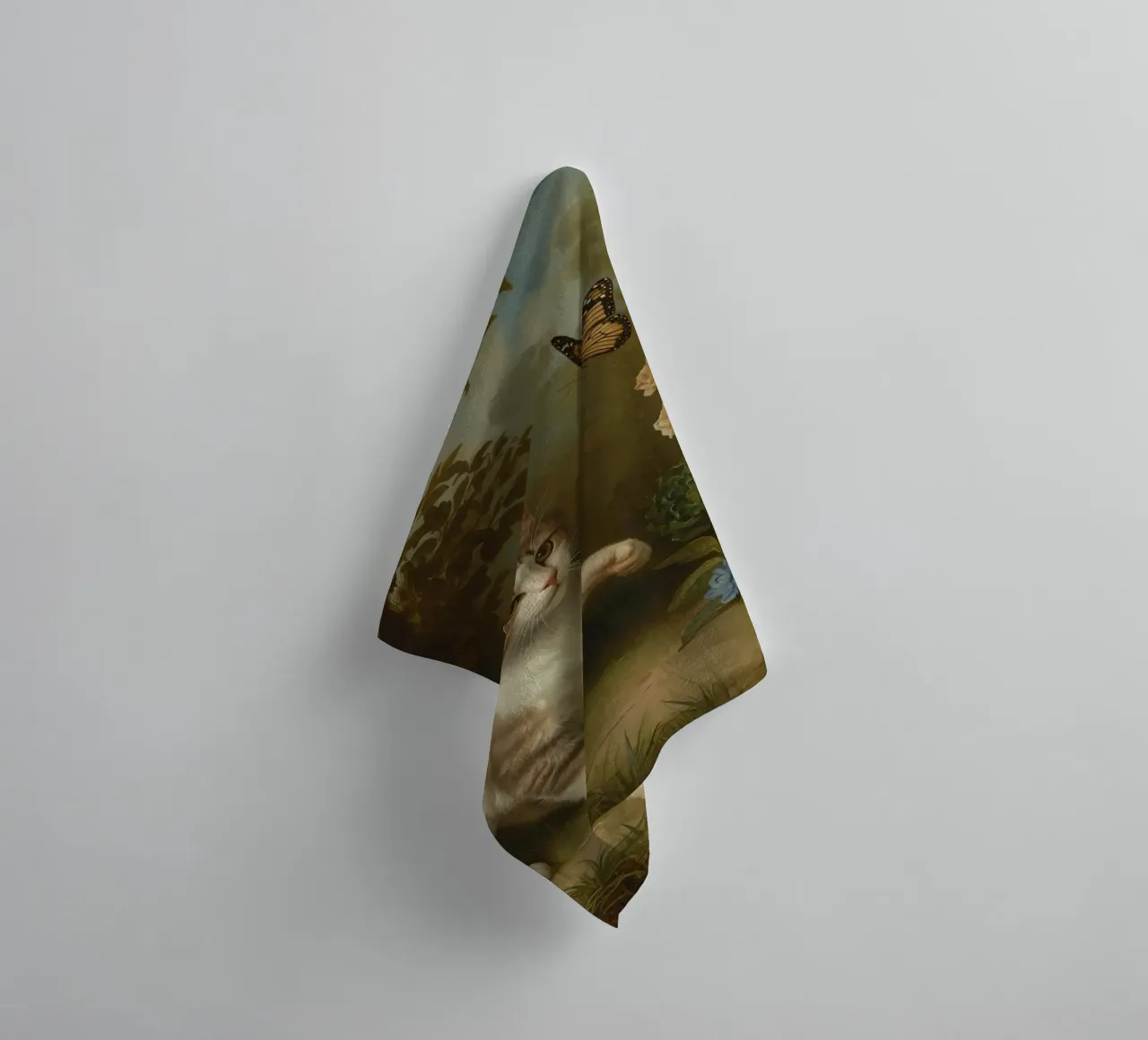 Cat strolling through garden while playing with a butterfly towel by DesignDoodle