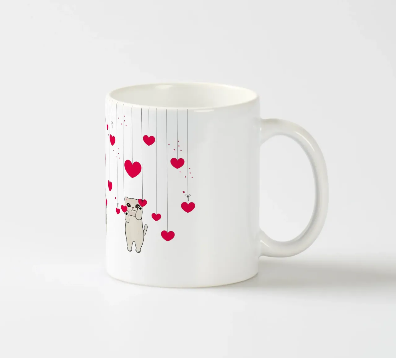 Cuori e stelle appesi con un simpatico gatto tazza in ceramica da gulsengunel