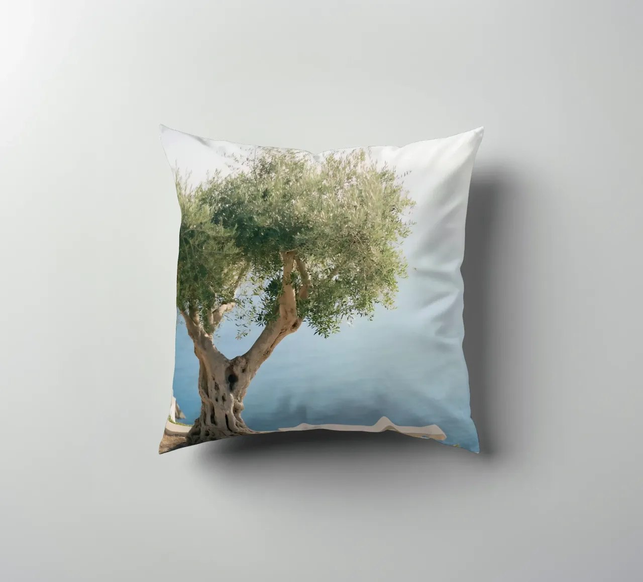 Mediterranean view under an olive tree decorative cushion by Casa Limon