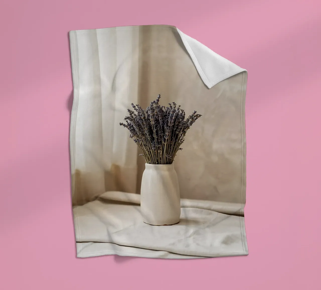 Bouquet of dried lavender in ceramic vase fleece blanket by Casa Limon
