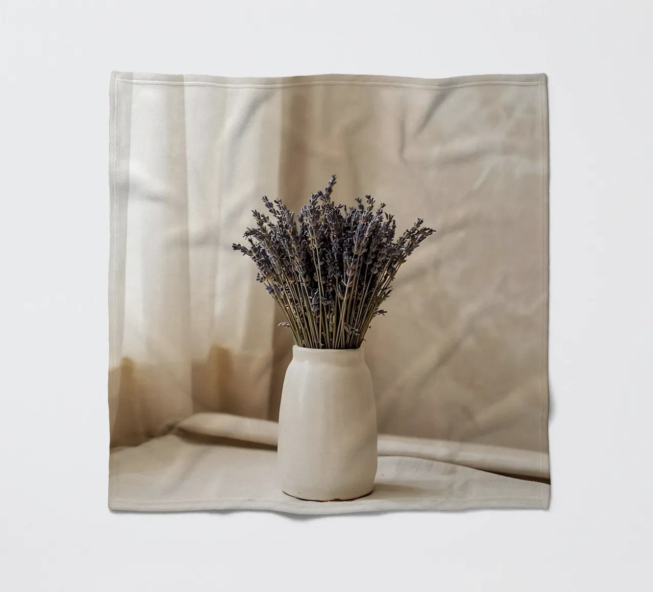 Bouquet of dried lavender in ceramic vase fleece blanket by Casa Limon